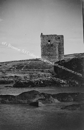 DUNBEACON CASTLE FROM N.SHORE (MR O'LEARY ON TOP)